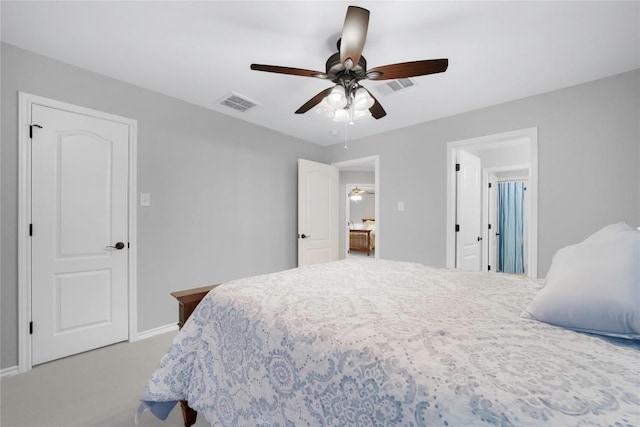 103 Sierra Ridge Dr, San Marcos, TX 78666 - bedroom with visible vents, baseboards, a ceiling fan, and light carpet