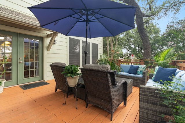 deck featuring french doors and an outdoor hangout area