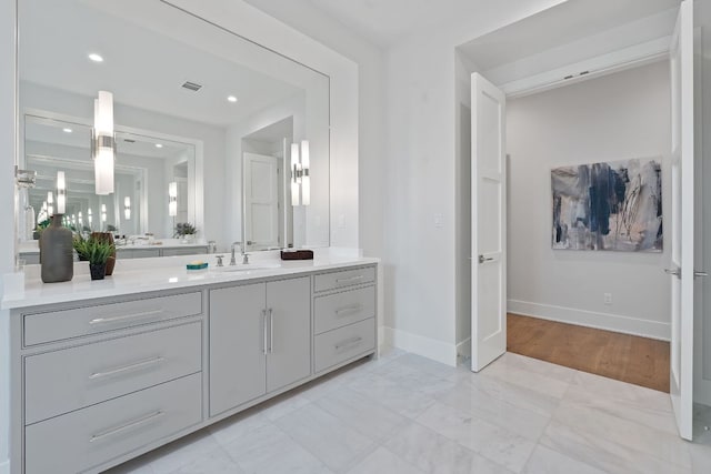 229 Tiffanie Way, Austin, TX 78737 - bathroom with recessed lighting, baseboards, visible vents, and vanity