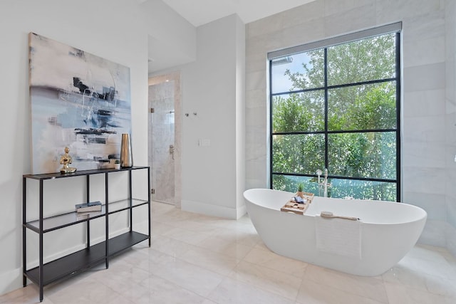 229 Tiffanie Way, Austin, TX 78737 - bathroom with a freestanding tub and walk in shower
