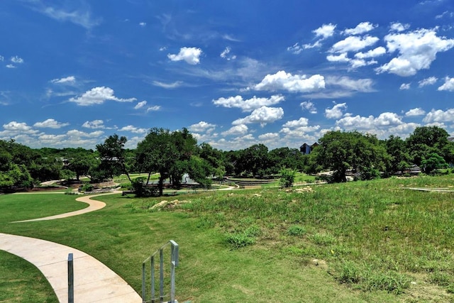 surrounding community featuring a yard