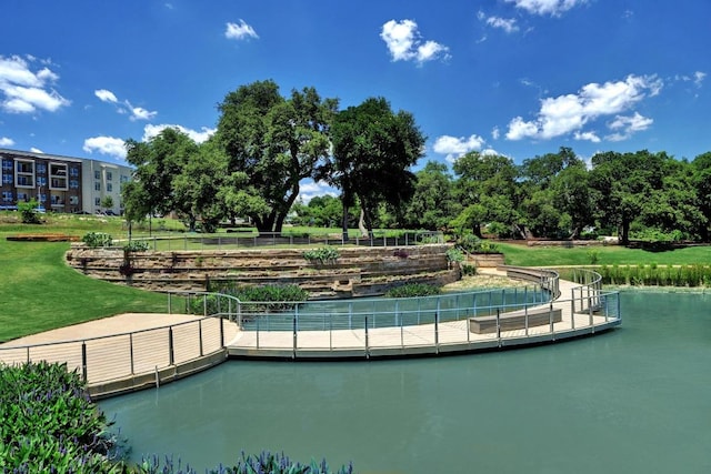 surrounding community with a yard