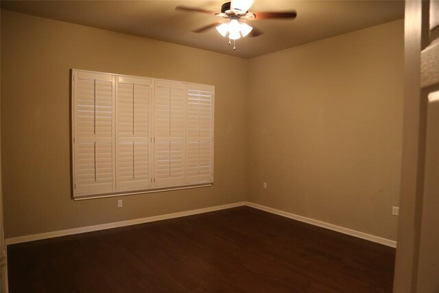 196 Whispering Wind Dr, Georgetown, TX 78633 - spare room with ceiling fan, dark wood finished floors, and baseboards