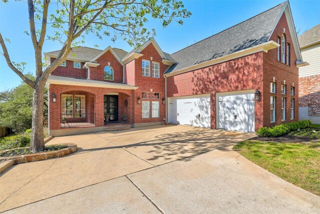 10768 Bramblecrest Dr, Austin, TX 78726 - traditional home featuring brick siding, driveway, covered porch, and a shingled roof