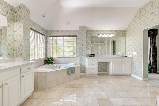10768 Bramblecrest Dr, Austin, TX 78726 - full bath with two vanities, a stall shower, vaulted ceiling, a bath, and wallpapered walls