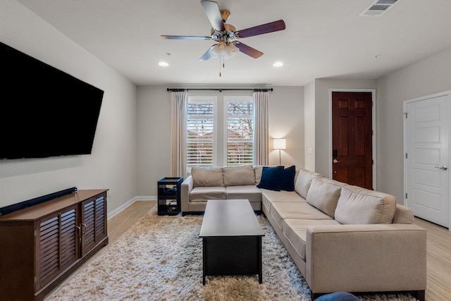 living room featuring visible vents, recessed lighting, light wood-style floors, and ceiling fan