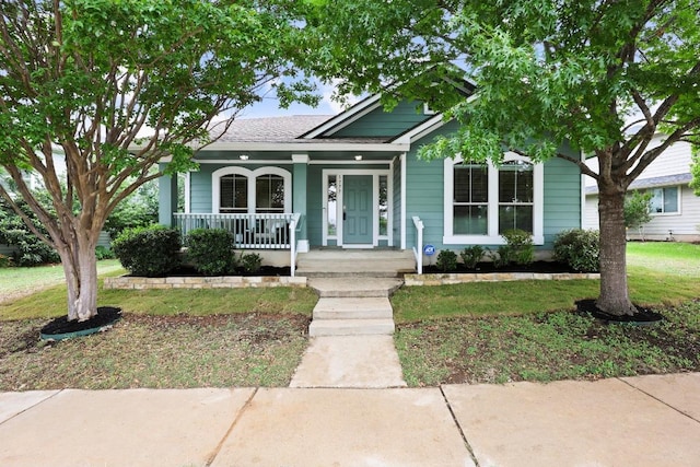 1777 Thompson Trl, Round Rock, TX 78664 - bungalow-style home featuring a porch, a front yard, and a shingled roof