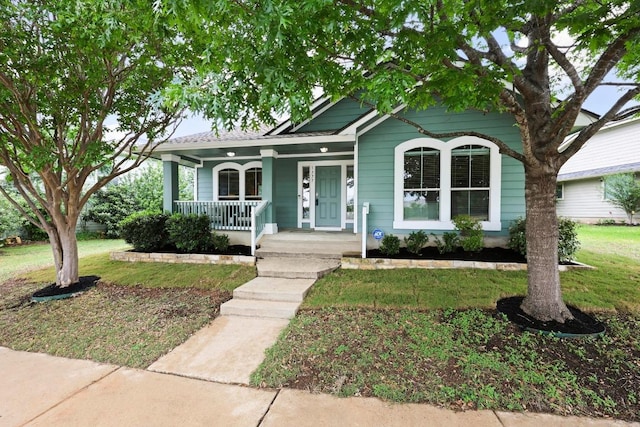 1777 Thompson Trl, Round Rock, TX 78664 - view of front facade with a porch and a front lawn