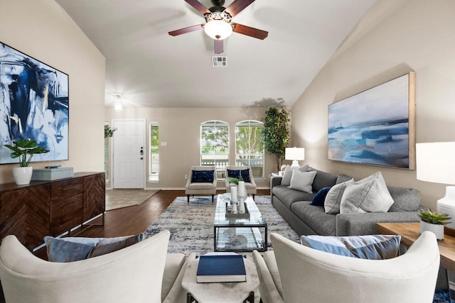 1777 Thompson Trl, Round Rock, TX 78664 - living area featuring visible vents, wood finished floors, lofted ceiling, baseboards, and ceiling fan