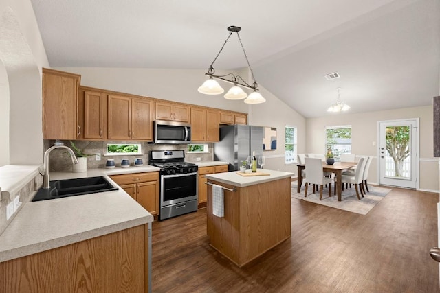 1777 Thompson Trl, Round Rock, TX 78664 - kitchen featuring a sink, light countertops, stainless steel appliances, visible vents, and dark wood-style floors