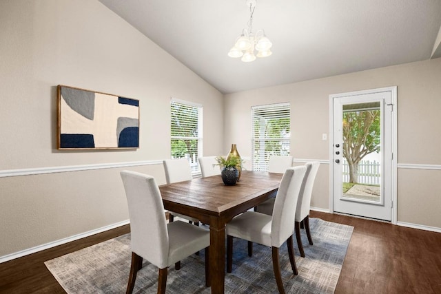 1777 Thompson Trl, Round Rock, TX 78664 - dining room with baseboards, an inviting chandelier, wood finished floors, and vaulted ceiling