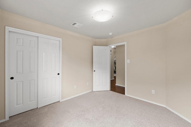 1777 Thompson Trl, Round Rock, TX 78664 - unfurnished bedroom with visible vents, carpet, baseboards, and a closet