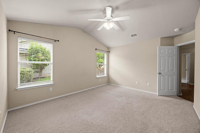 1777 Thompson Trl, Round Rock, TX 78664 - carpeted empty room featuring visible vents, baseboards, ceiling fan, and lofted ceiling