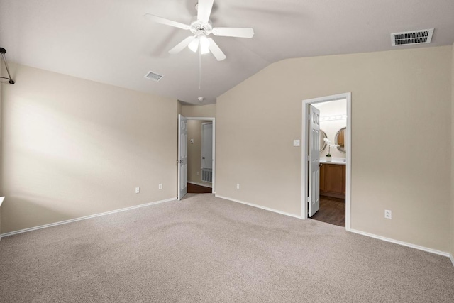 1777 Thompson Trl, Round Rock, TX 78664 - unfurnished bedroom featuring carpet flooring, baseboards, vaulted ceiling, ensuite bathroom, and a ceiling fan