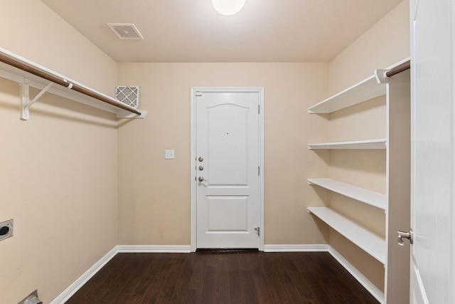 425 Valley Oaks Loop, Georgetown, TX 78626 - walk in closet featuring wood finished floors