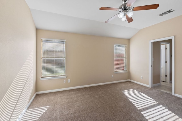 425 Valley Oaks Loop, Georgetown, TX 78626 - unfurnished bedroom with carpet, baseboards, vaulted ceiling, and a ceiling fan