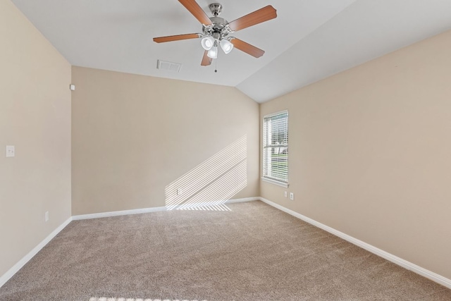 425 Valley Oaks Loop, Georgetown, TX 78626 - empty room with carpet, a ceiling fan, baseboards, and vaulted ceiling