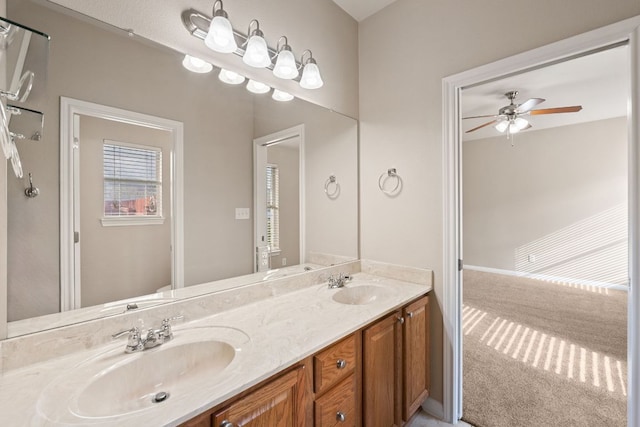 425 Valley Oaks Loop, Georgetown, TX 78626 - full bathroom featuring double vanity, a ceiling fan, and toilet