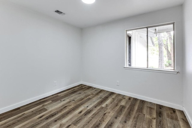5912 Wagon Bnd, Austin, TX 78744 - unfurnished room with wood finished floors