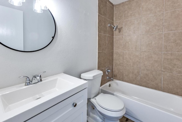 5912 Wagon Bnd, Austin, TX 78744 - bathroom with vanity, washtub / shower combination, and a textured wall