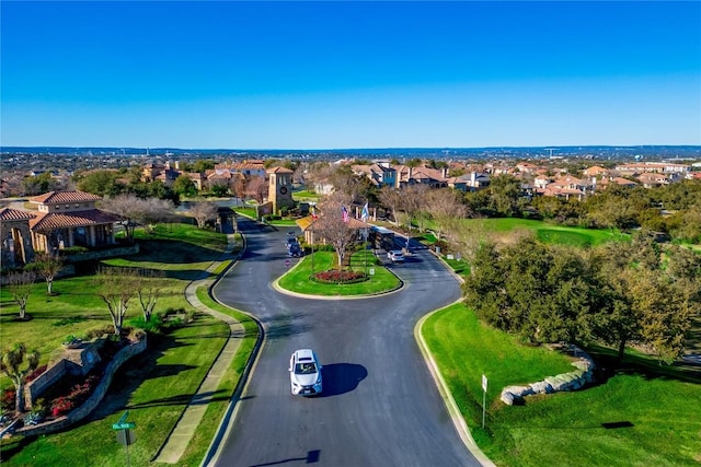 birds eye view of property with a residential view