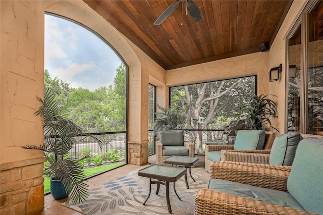 sunroom / solarium with ceiling fan