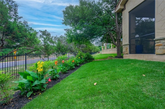 view of yard with fence