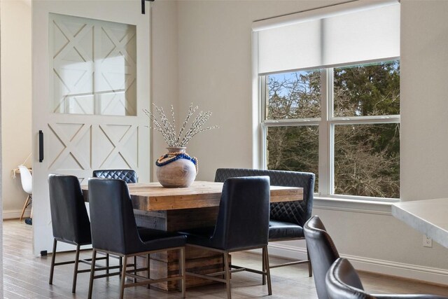 216 Vista Village Cv, Austin, TX 78738 - dining area with wood finished floors and baseboards