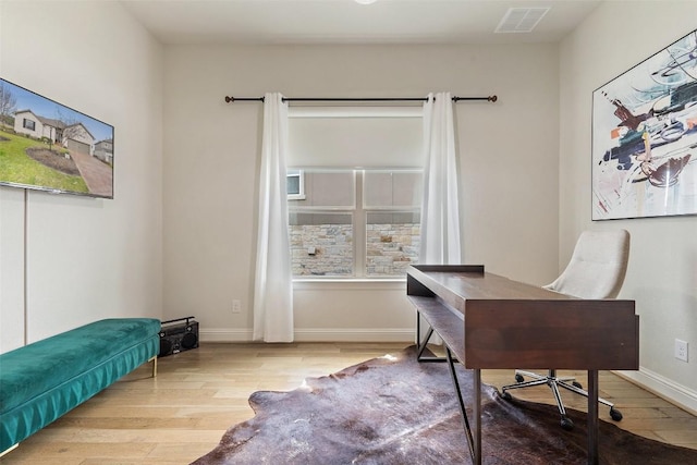 216 Vista Village Cv, Austin, TX 78738 - office area featuring wood finished floors and baseboards