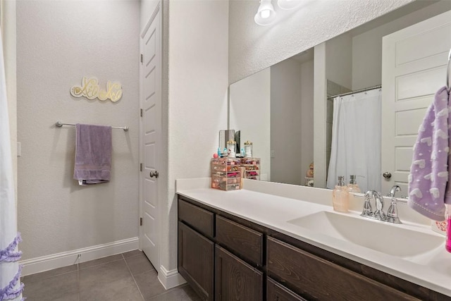 216 Vista Village Cv, Austin, TX 78738 - full bathroom with tile patterned floors, vanity, and curtained shower
