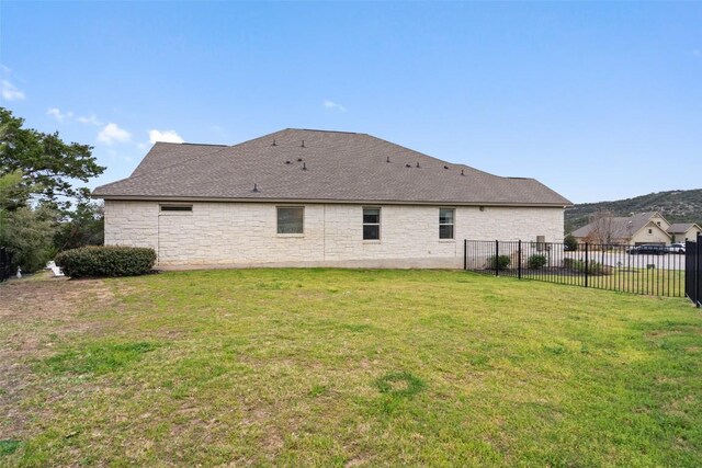 216 Vista Village Cv, Austin, TX 78738 - rear view of property with stone siding and roof with shingles