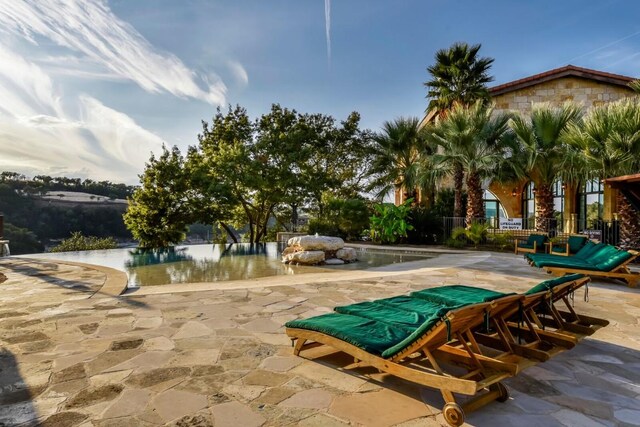 216 Vista Village Cv, Austin, TX 78738 - view of home's community featuring a patio area