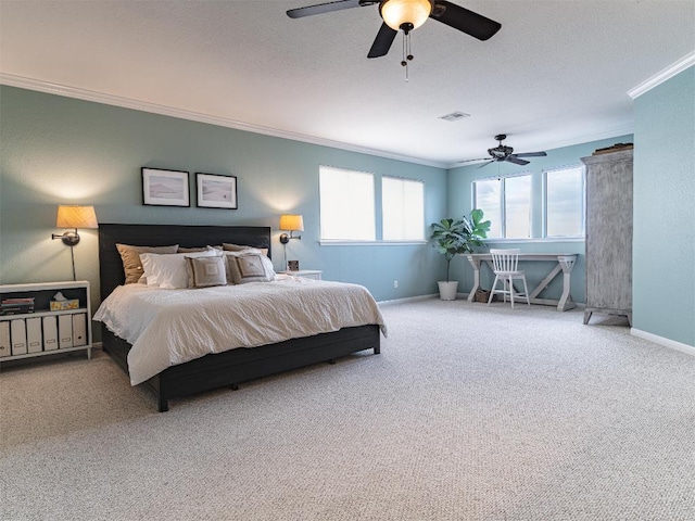 19200 White Horse Cv, Spicewood, TX 78669 - carpeted bedroom featuring a ceiling fan, baseboards, visible vents, and ornamental molding