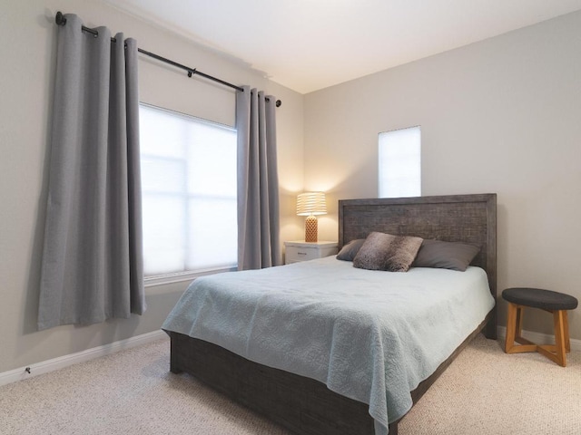 19200 White Horse Cv, Spicewood, TX 78669 - carpeted bedroom featuring baseboards