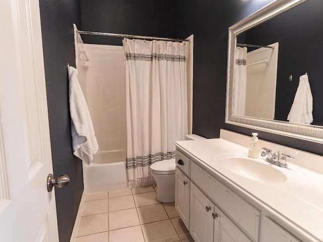19200 White Horse Cv, Spicewood, TX 78669 - full bath featuring tile patterned floors, shower / bath combo, vanity, and toilet