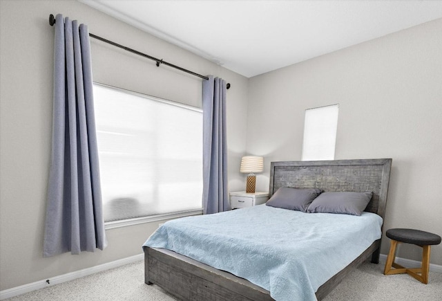 19200 White Horse Cv, Spicewood, TX 78669 - bedroom featuring carpet and baseboards