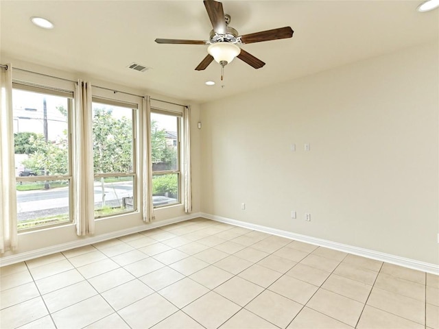 empty room with visible vents, baseboards, ceiling fan, recessed lighting, and light tile patterned floors