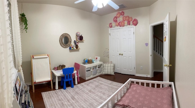 2305 Amen Corner Rd, Pflugerville, TX 78660 - bedroom with a ceiling fan, a closet, wood finished floors, and visible vents