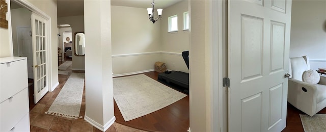 2305 Amen Corner Rd, Pflugerville, TX 78660 - corridor featuring arched walkways and a notable chandelier