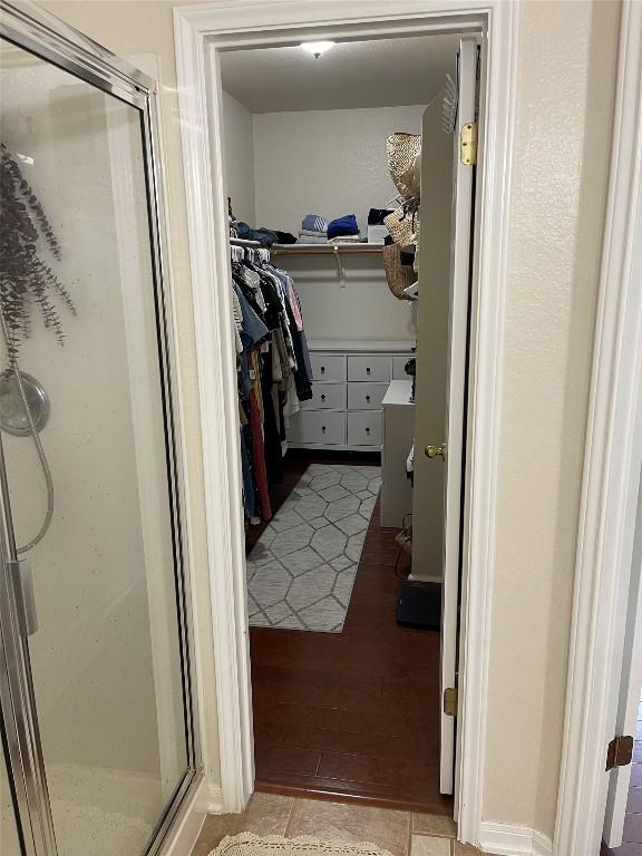 2305 Amen Corner Rd, Pflugerville, TX 78660 - walk in closet featuring light wood-type flooring