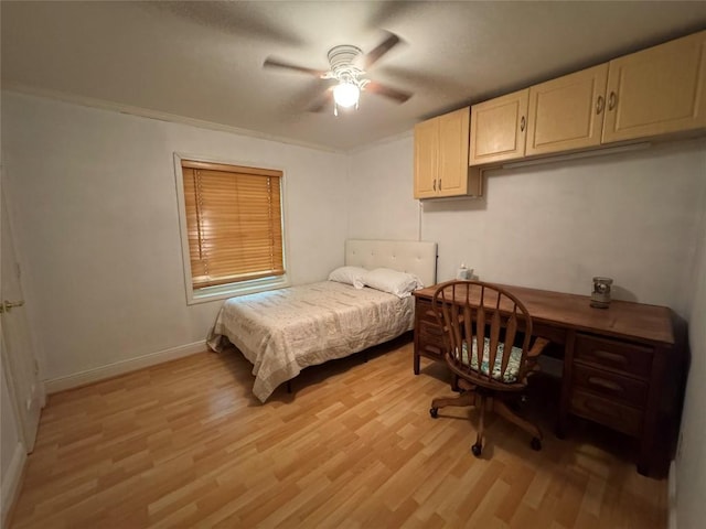 bedroom with baseboards, a ceiling fan, and light wood finished floors