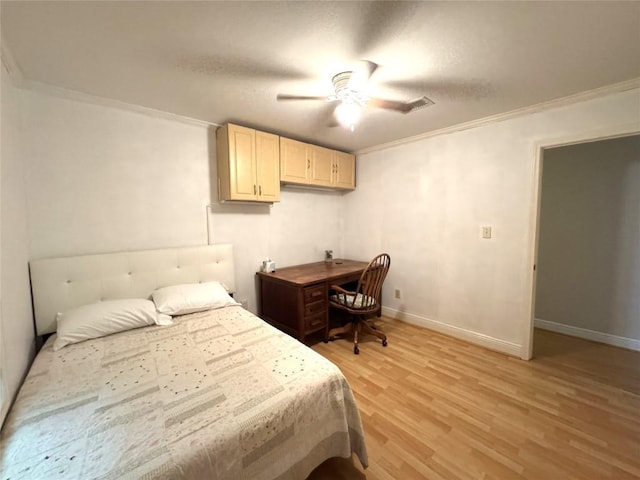 bedroom with crown molding, visible vents, baseboards, ceiling fan, and light wood-type flooring