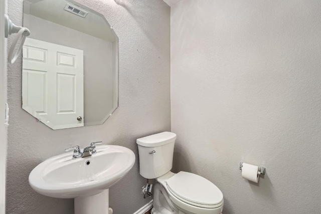 9504 Southwick Dr, Austin, TX 78724 - bathroom with toilet and a sink