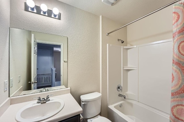 9504 Southwick Dr, Austin, TX 78724 - full bathroom featuring shower / bathtub combination with curtain, vanity, a textured wall, and toilet