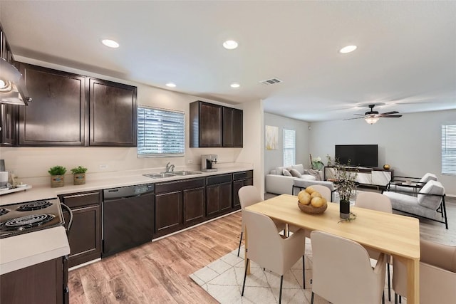 9504 Southwick Dr, Austin, TX 78724 - kitchen featuring black dishwasher, a sink, dark brown cabinetry, light countertops, and ceiling fan