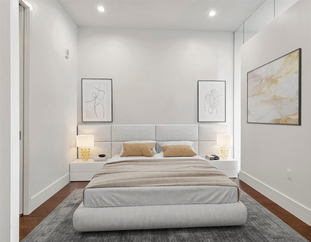 bedroom featuring recessed lighting, baseboards, and dark wood-style flooring