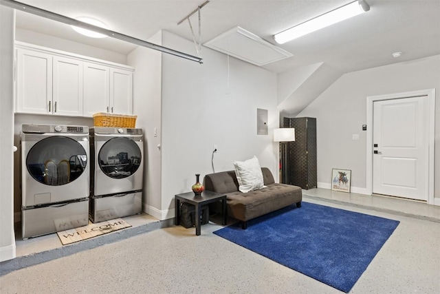 laundry area featuring cabinet space, washer and dryer, attic access, baseboards, and electric panel