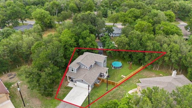 110 Manana Ct, Bastrop, TX 78602 - aerial view of property and surrounding area with property boundaries highlighted and a forest