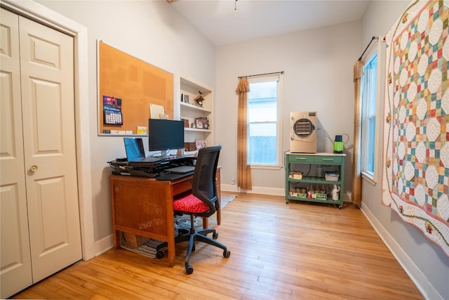 913 Fowzer St, Taylor, TX 76574 - office featuring baseboards and light wood finished floors