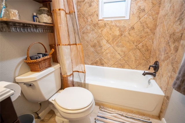 913 Fowzer St, Taylor, TX 76574 - bathroom with toilet and shower / bath combination with curtain